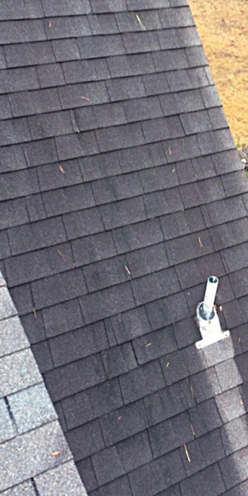 Before soft washing for Pressure Washing Chelsea AL showing black algae streaks on a shingle roof.