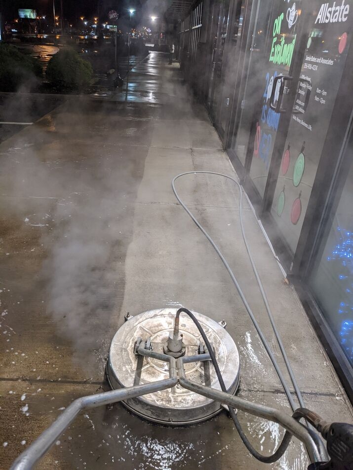 Concrete sidewalk cleaning at an Allstate business location, providing professional Pressure Washing Hoover.